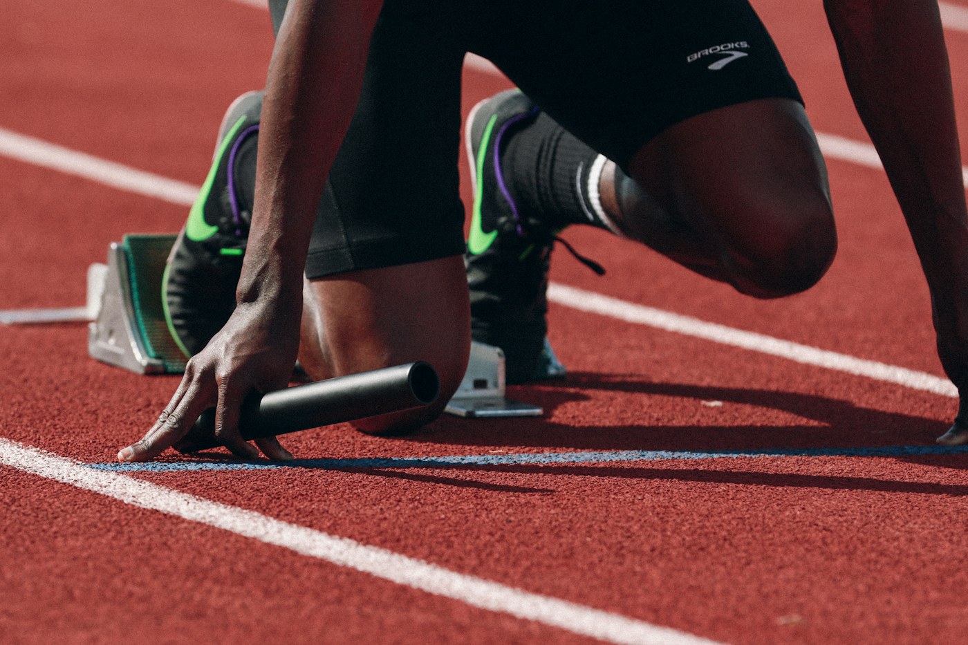 Atletas correndo em uma competição esportiva