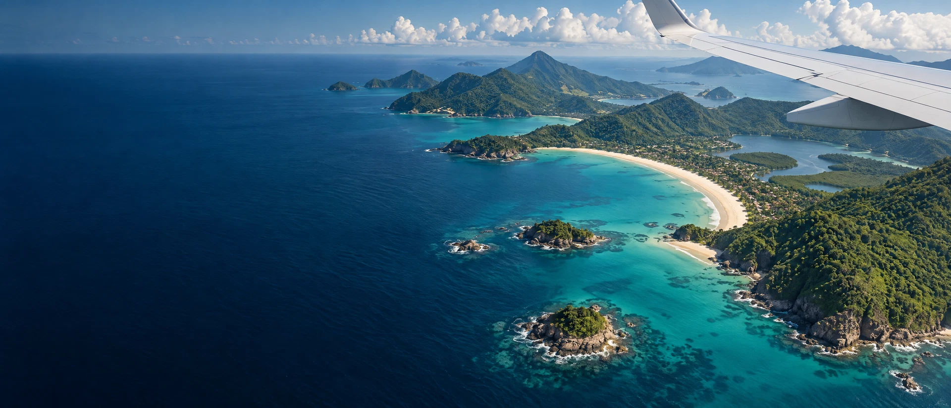 Vista aérea de uma ilha tropical sobre águas azul-turquesa